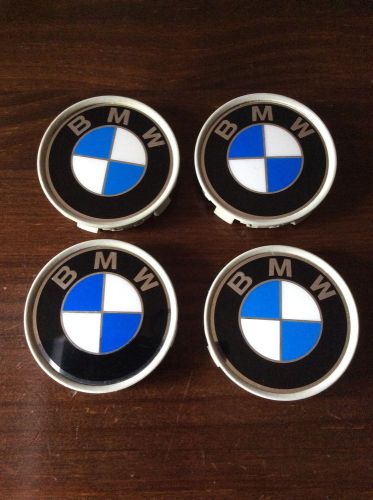 Bmw center cap set           genuine oem bmw part