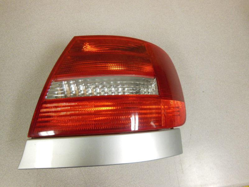 99 2000 2001 audi a4 right rear passenger side tail light oem silver trim cover
