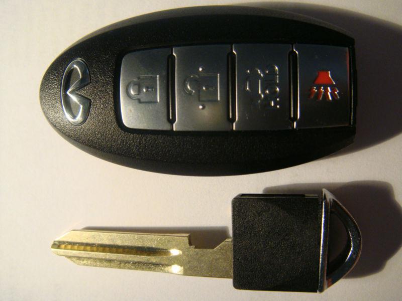 1 used kbrtn001 05-07 infiniti g35 smart key fob w/uncut emergency key w/chip