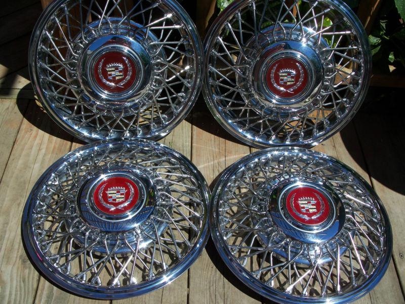 Unused 1985-93 14" cadillac spoked hubcaps full set wheel covers eldorado+most 