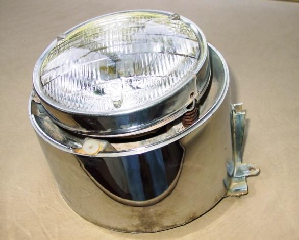 64 1964 olds oldsmobile left inner head light bucket part # guide 3 sae h64