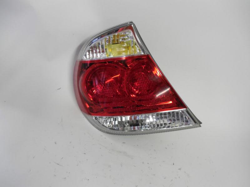 05 06 toyota camry oem left tail light nice!