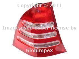 Mercedes w203 c-class taillight assembly left oem new + 1 year warranty