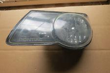 Read first 01-05 pontiac aztek clear headlight left driver side oem p/n 10010229