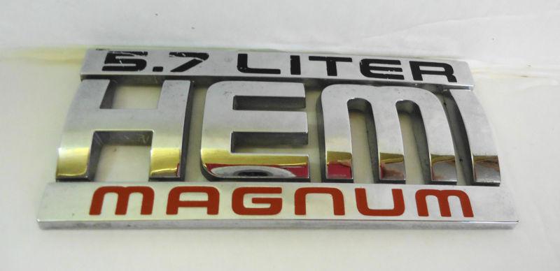 Used genuine oem mopar "5.7 liter hemi magnum" script emblem 55077661aa fender