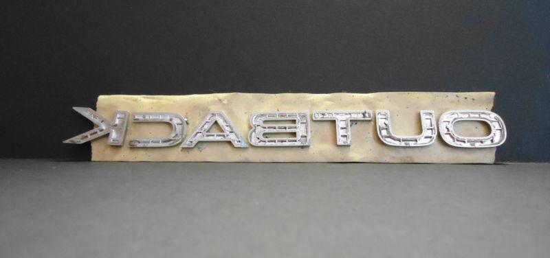 Used 2005-2009 subaru "outback" legacy emblem fits liftgate part#  93074ag06 oem