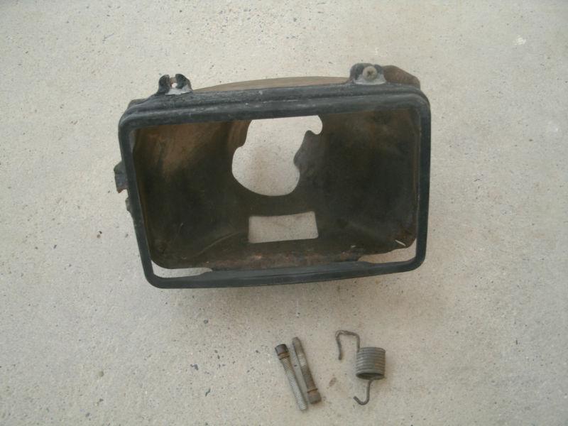 1982-1992 camaro l/h driver side outer headlight lamp bucket bracket