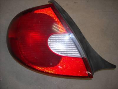 00 01 02 plymouth dodge neon tail light l/h 