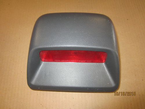 Stop light on back glass  mazda protege 1996-1997-1998