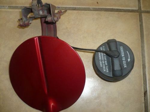 03 to 05  pt cruiser gas lid red fuel filler door