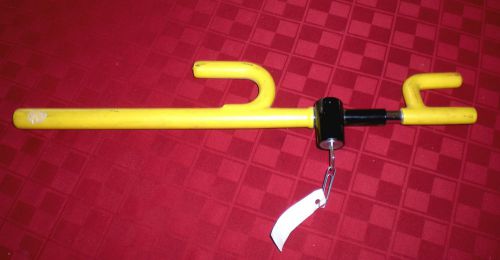 The &#034;club&#034;  -  steering wheel anti-theft locking bar - yellow - used