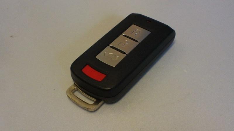 Mitsubishi outlander lancer 4 button smart key remote fcc id:ouc544m-key-n