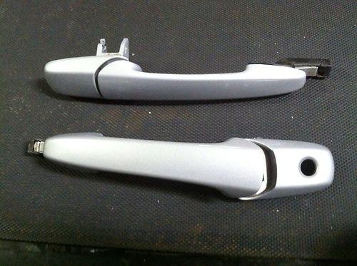 Oem ford 2005-2013 mustang outside door handle factory painted silver pair