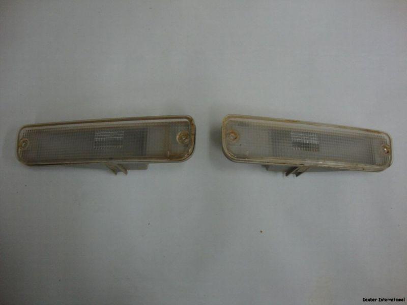 89 90 91 92 mitsubishi colt reverse light covers & assembly left & right oem