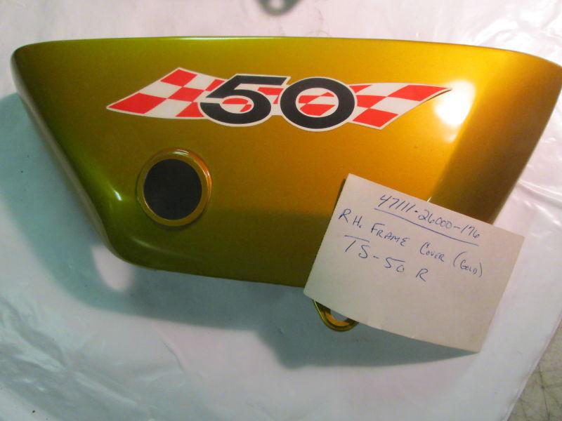 Suzuki ts50 nos oem r/h side cover with decal in gold 1971 p.n. 47111-26000-176