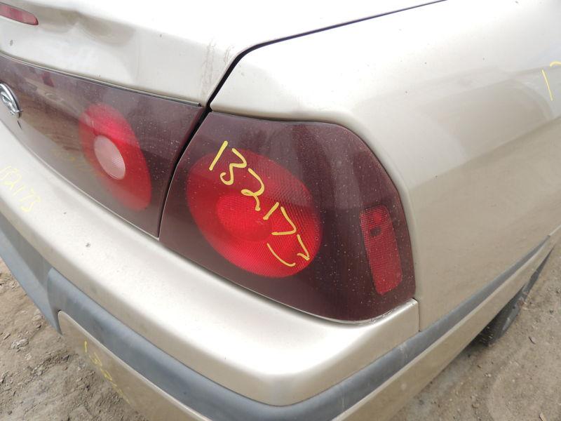 00 01 02 03 04 impala r. tail light quarter panel mounted w/o body colored