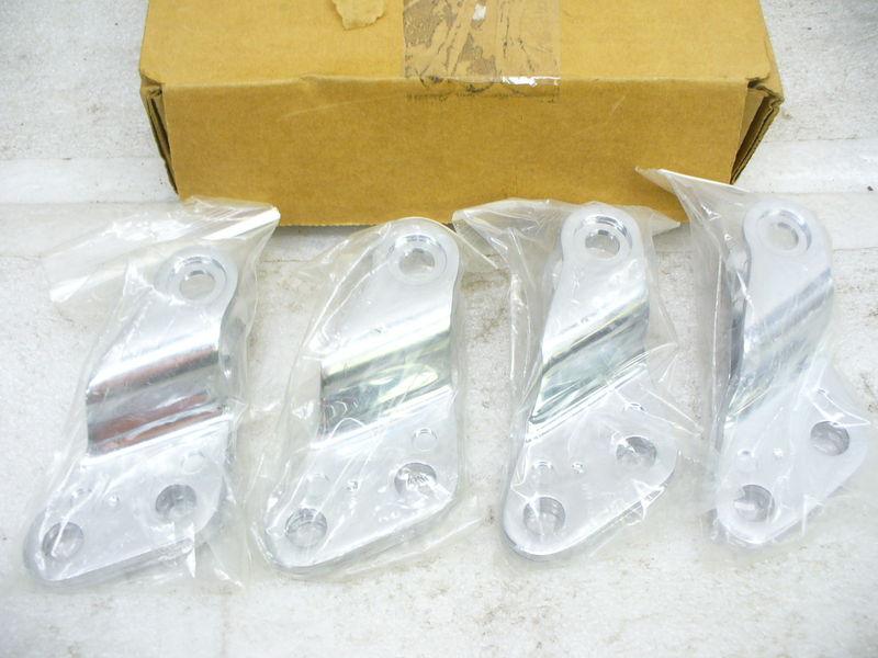 Harley 04 xl models chrome motor mount parts, four parts total.