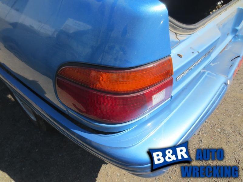 Left taillight for 93 94 95 96 escort ~ htbk   4782216